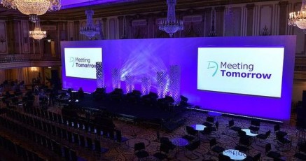 Dual Screen AV-Drop Modular Backdrop surround in white with rear screens and up lighting in blue.