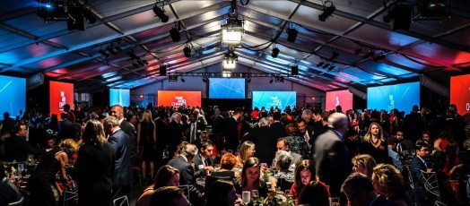 Multiple Av-Drop Modular backdrop screens with black skirts for university dinner event