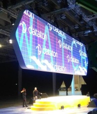 Custom curved AV-Drop Modular Backdrop front projection screen for corporate event in convention center