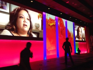 Dual screen AV-Drop Modular Backdrop surround with recessed panels for light cove and projection of red rose setup by spain