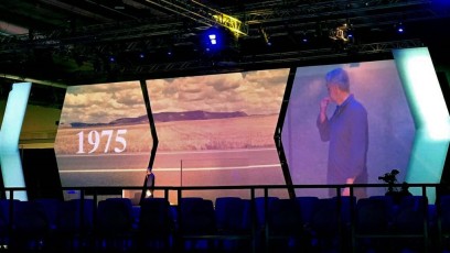 Hexagon AV-Drop Modular Backdrop covered in white seamless fabric for front projection for corporate meeting